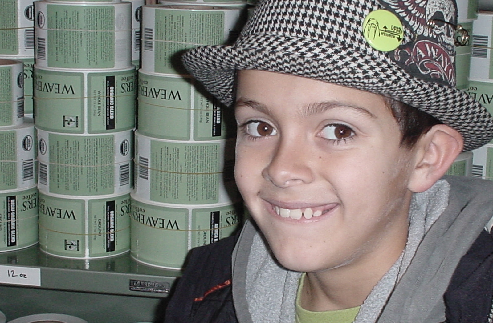 Alexander Brown with rolls of Weaver's Coffee labels in the background.