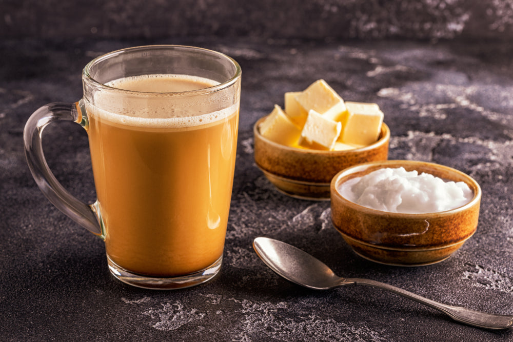 Bulletproof coffee, blended with butter and MCT coconut oil, paleo, keto, ketogenic drink breakfast.