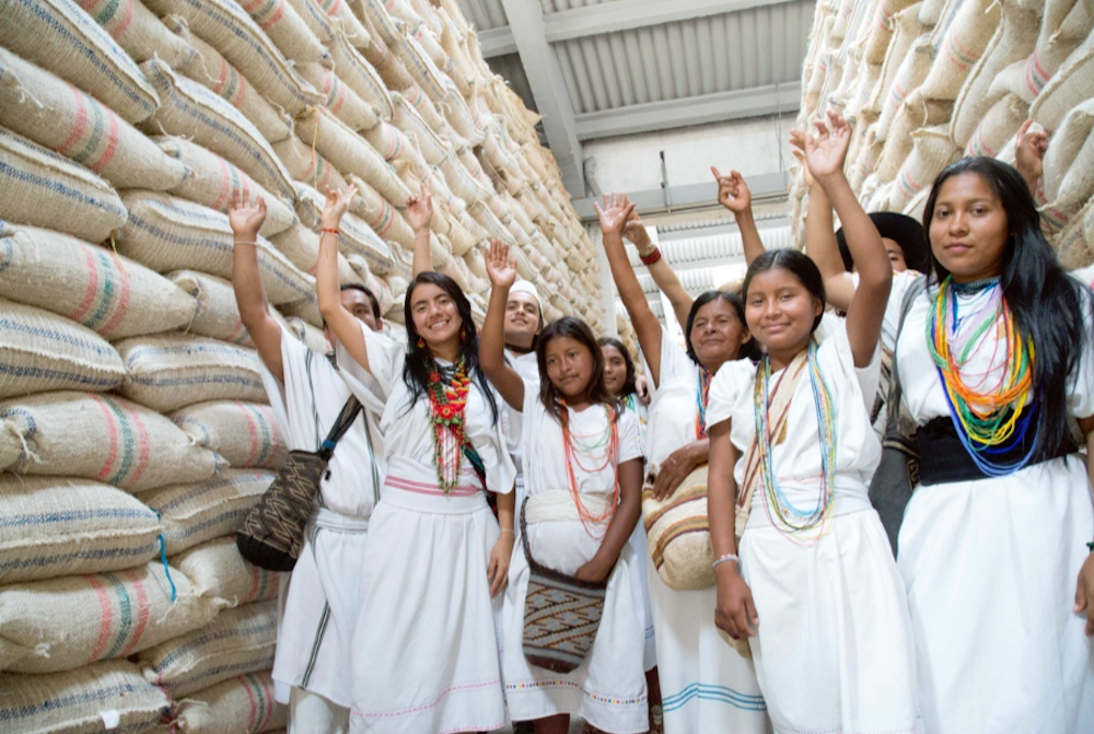 Colombian Coffee bags and indigenous daughters of coffee farmers who attend school in Colombia.