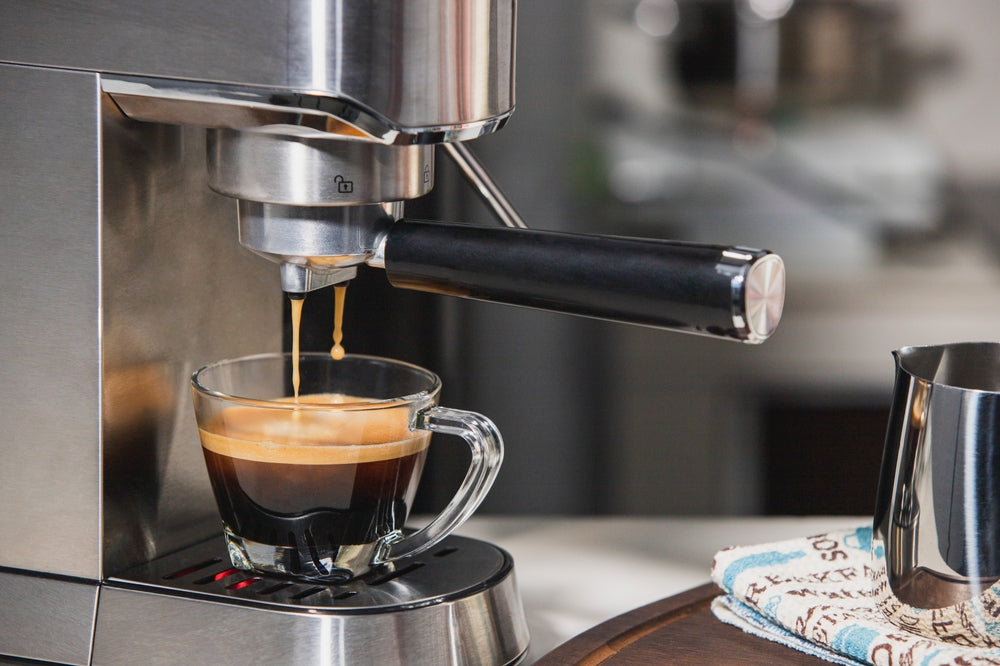 Espresso machine making coffee in the morning.