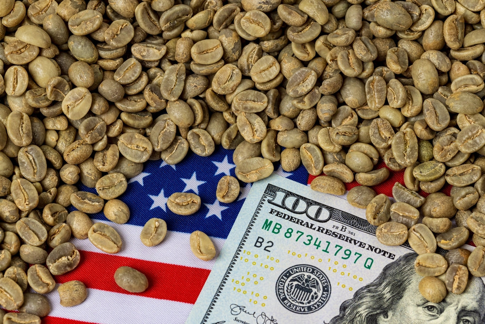Green coffee beans with United States flag and cash money.