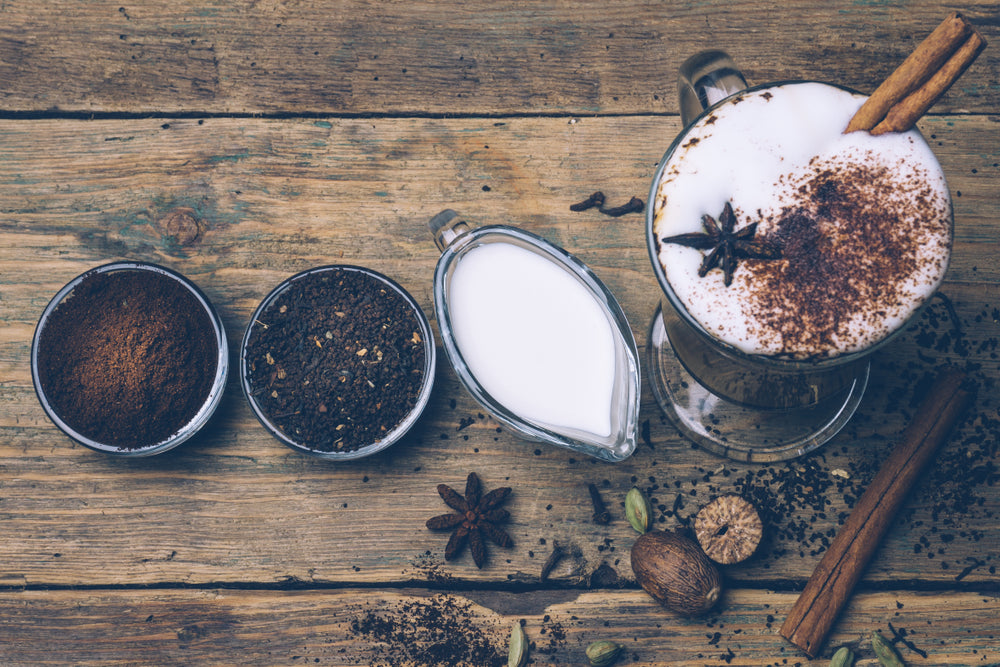 SPICE DIRTY CHAI LATTE. Masala chai and espresso. Autumn or winter warm spice coffee drink.