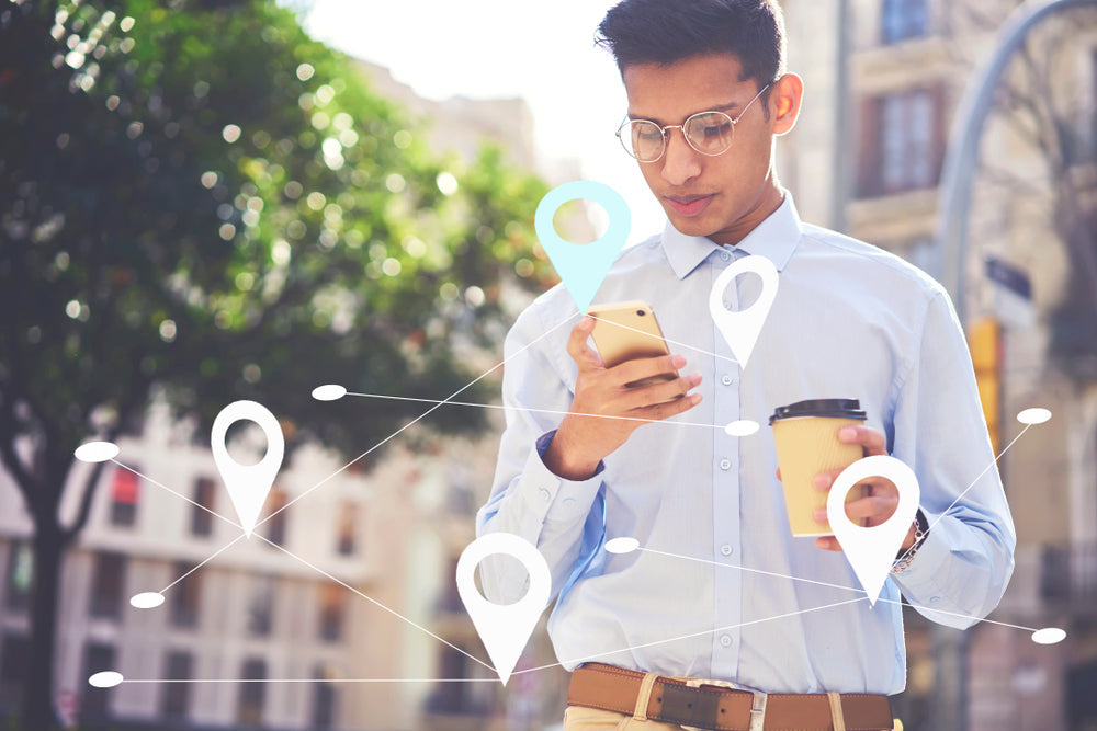 Young male searching via app for coffee near me.